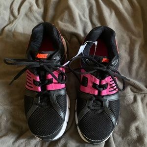 Black and Pink NIKE running shoes size 7.5